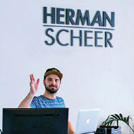 Man from Herman-Scheer waving.