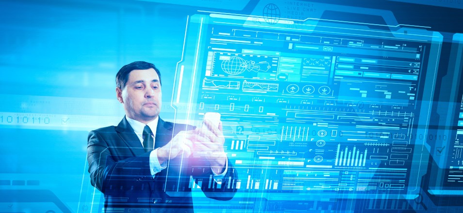 man in suit looking at phone with digital reporting dashboard in background