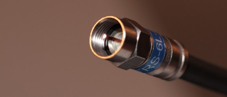 Close view of a coaxial cable male connection.