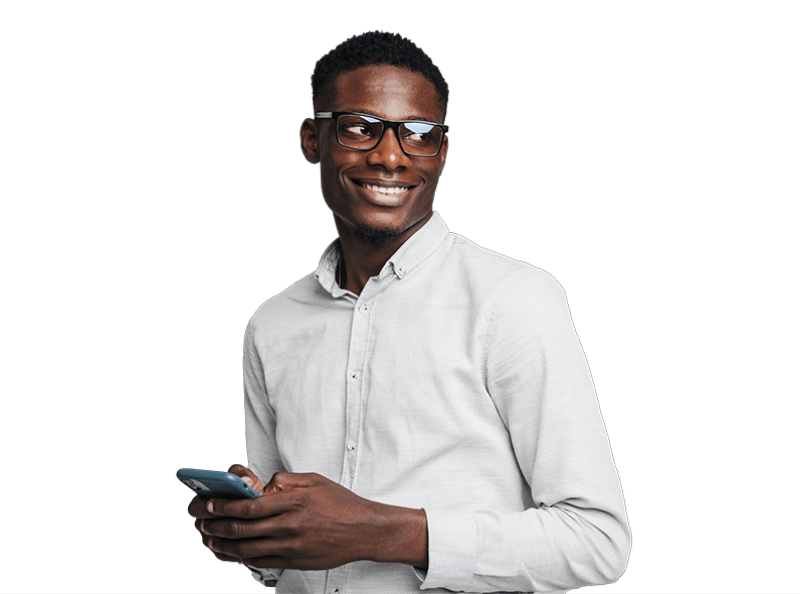 smiling fellow looking askance over his shoulder while holding cellphone