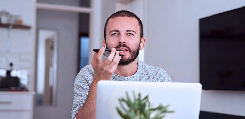 man talking on speakerphone